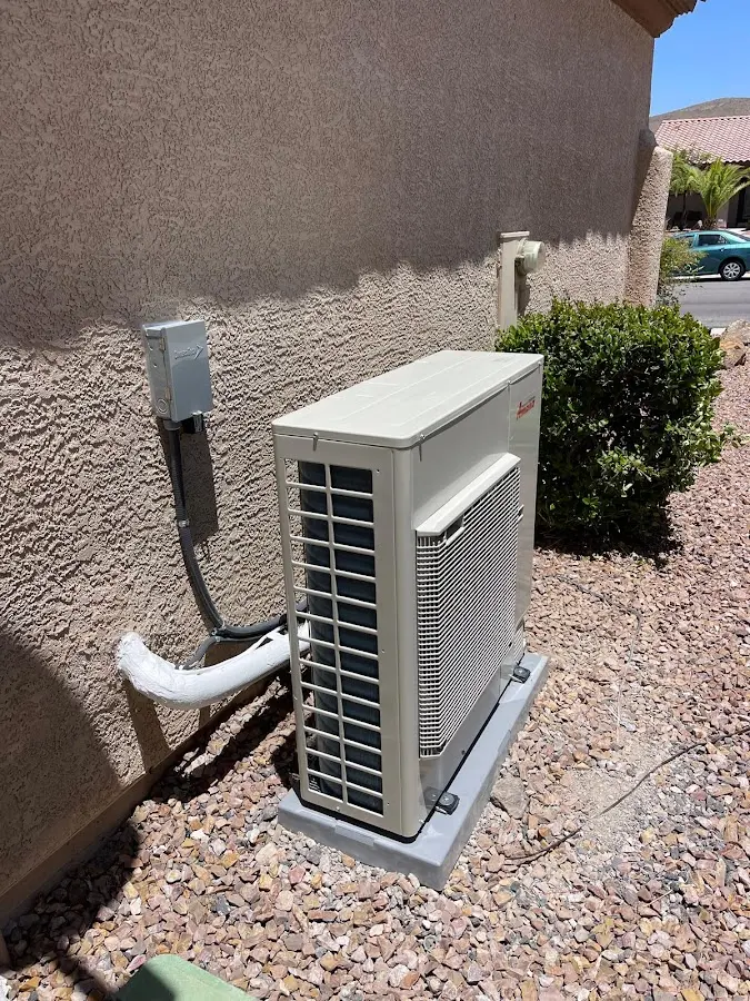 Residential air conditioning condenser unit in Warrensburg